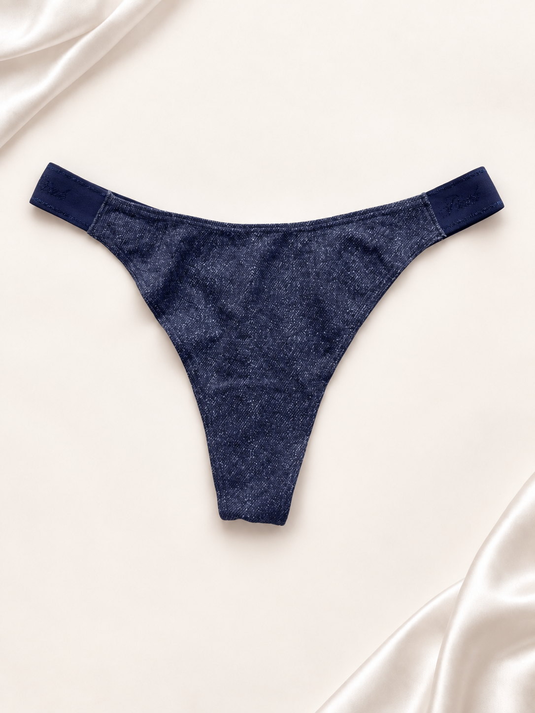 Panti azul marino liso de corte tanga, vista frente