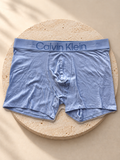 Boxer Calvin Klein celeste con banda logo