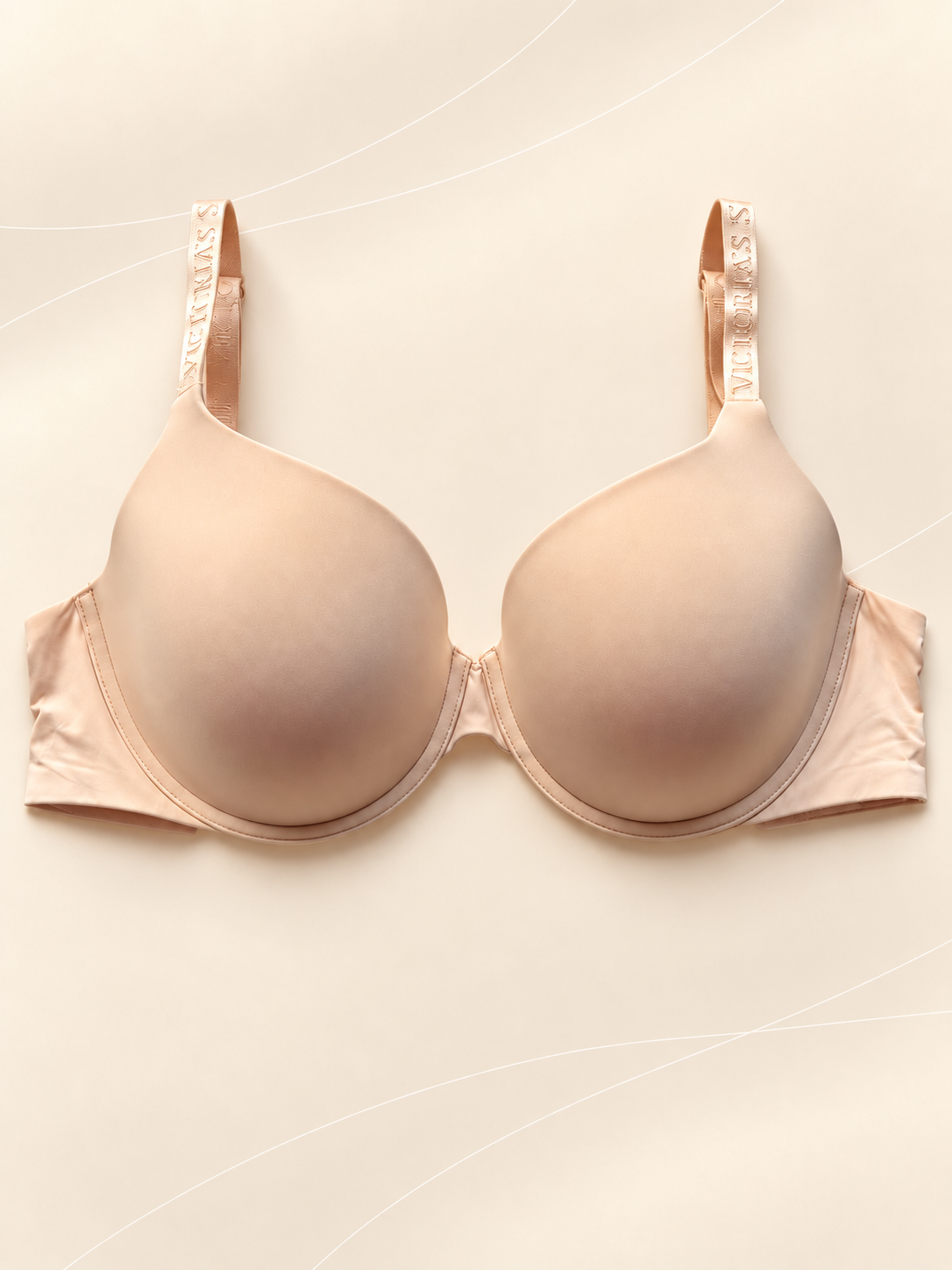 Corpiño V'S PINK Beige con Aro, vista frontal sobre fondo crema con líneas suaves