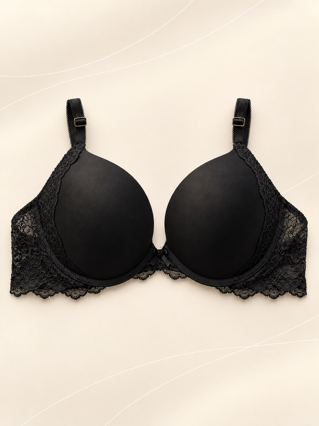 Corpiño V'S Negro Push-Up con Encaje, vista frontal sobre fondo crema con líneas suaves
