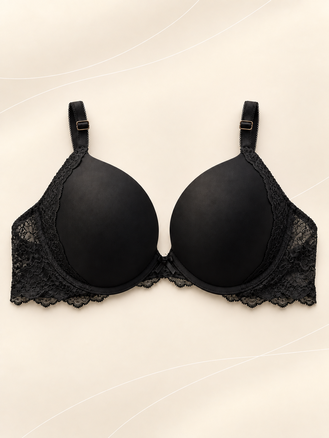 Corpiño V'S Negro Push-Up con Encaje, vista frontal sobre fondo crema con líneas suaves
