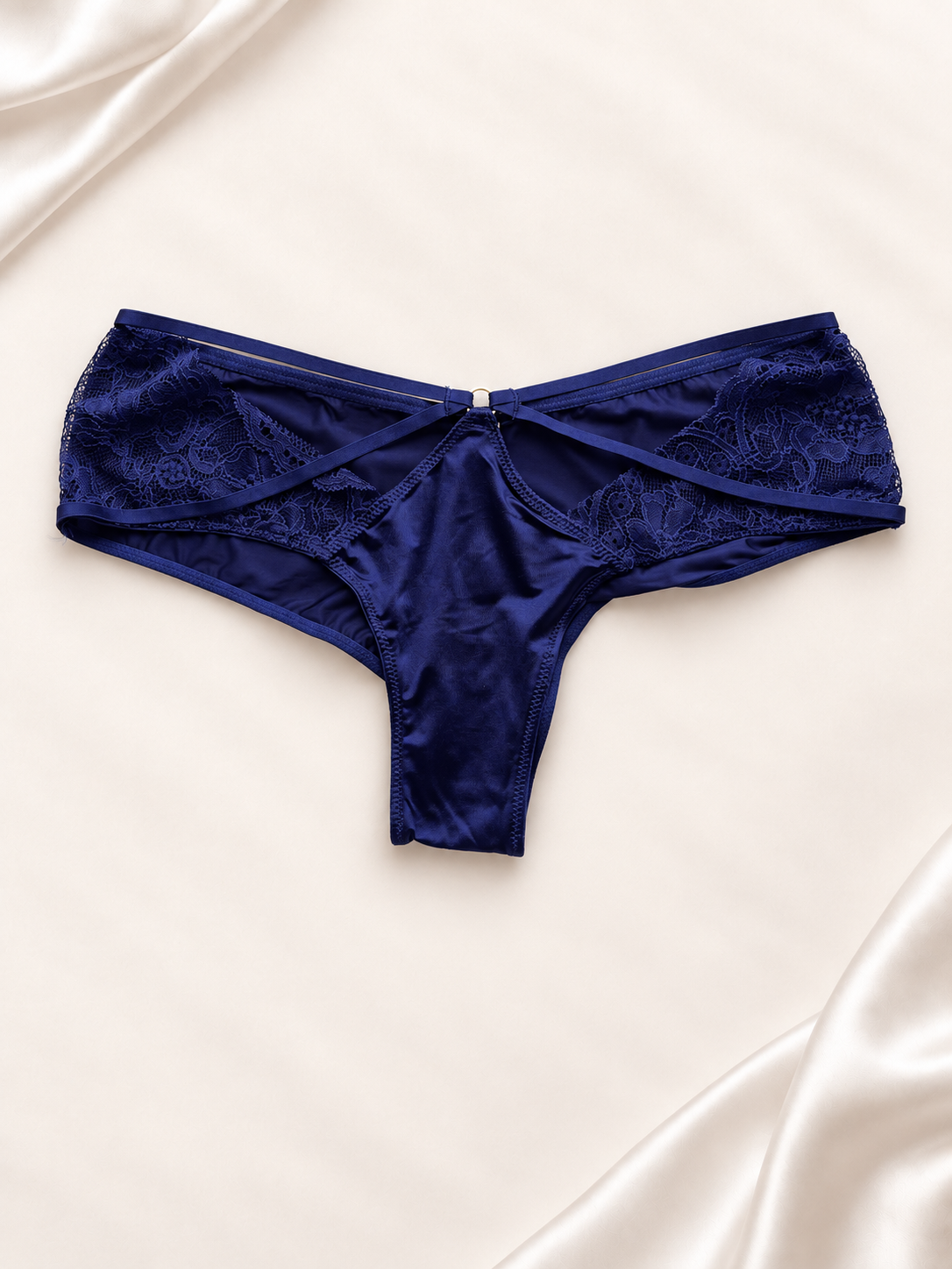 Panti V'S Azul marino con encaje y tiras cruzadas, vista frontal