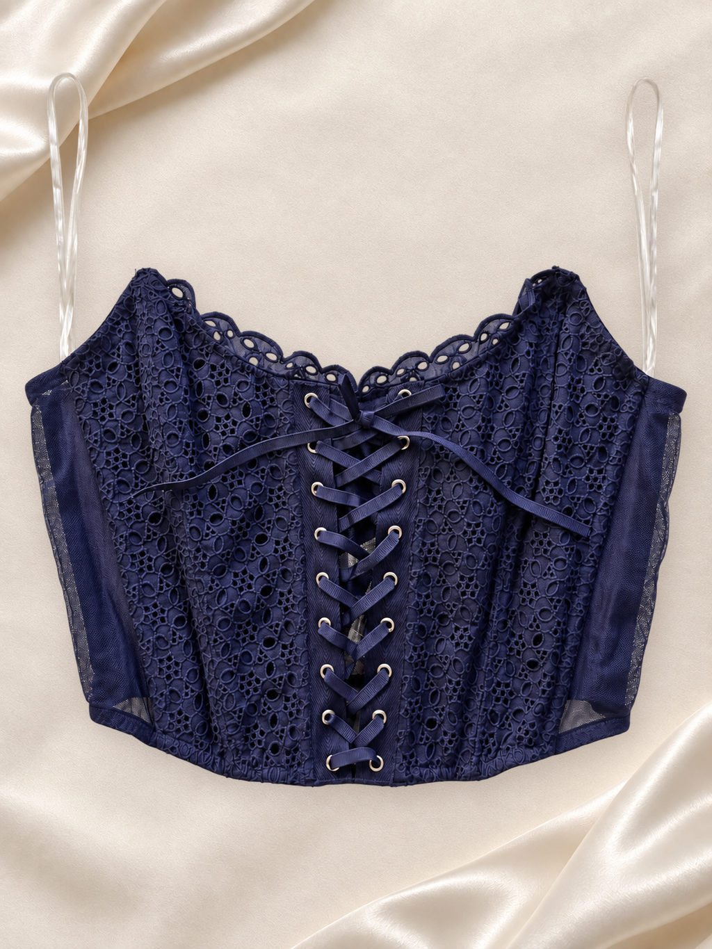 Corset V'S Azul Marino de Encaje con Cordón, vista frontal sobre fondo marfil
