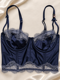 Bustier Satinado Azul Marino con Encaje y Aro, vista frontal sobre fondo marfil