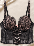 Bustier Negro de Encaje con Aro y Detalle Cruzado, vista frontal sobre fondo marfil