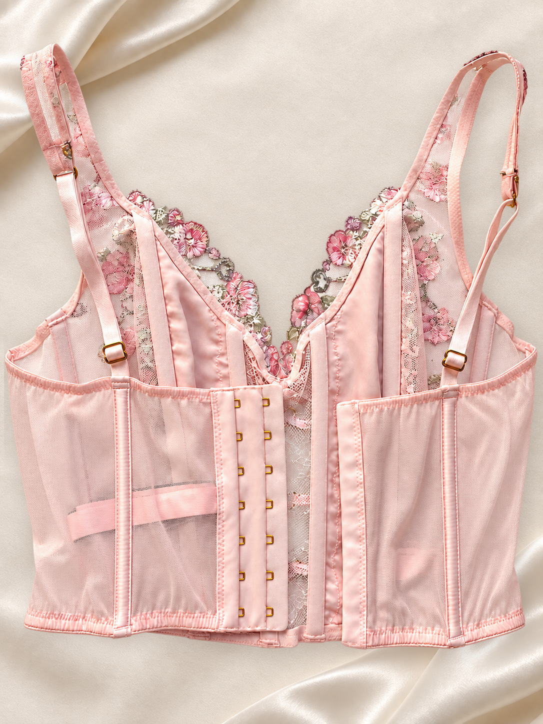 Corset V'S Floral Rosa de Tul con Lazo Satinado, vista dorsal sobre fondo marfil