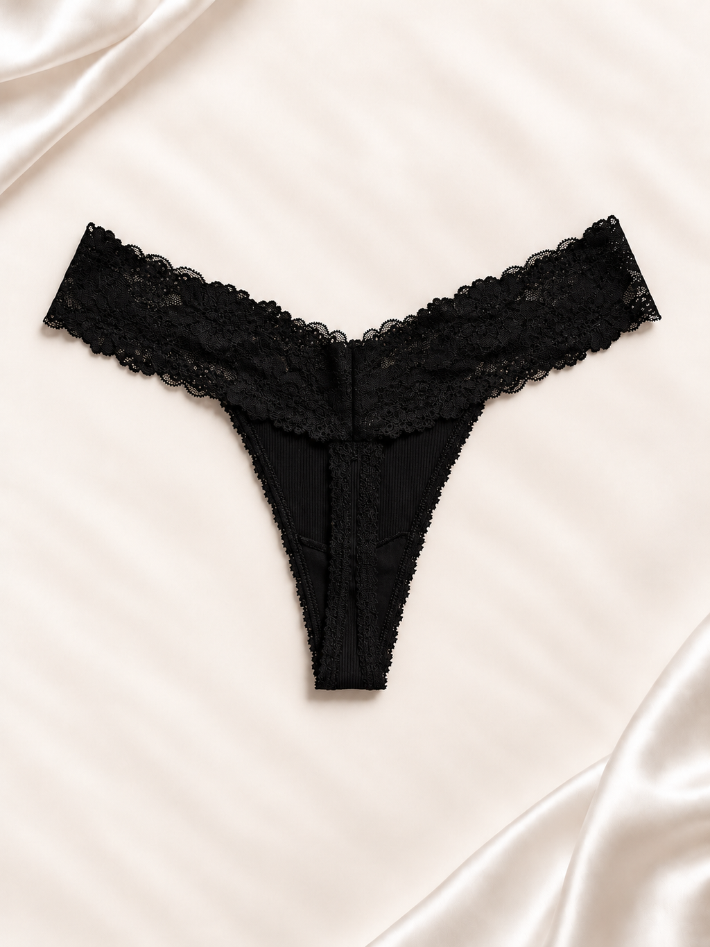 Dorso de Panti V'S negro de encaje con cintura floral