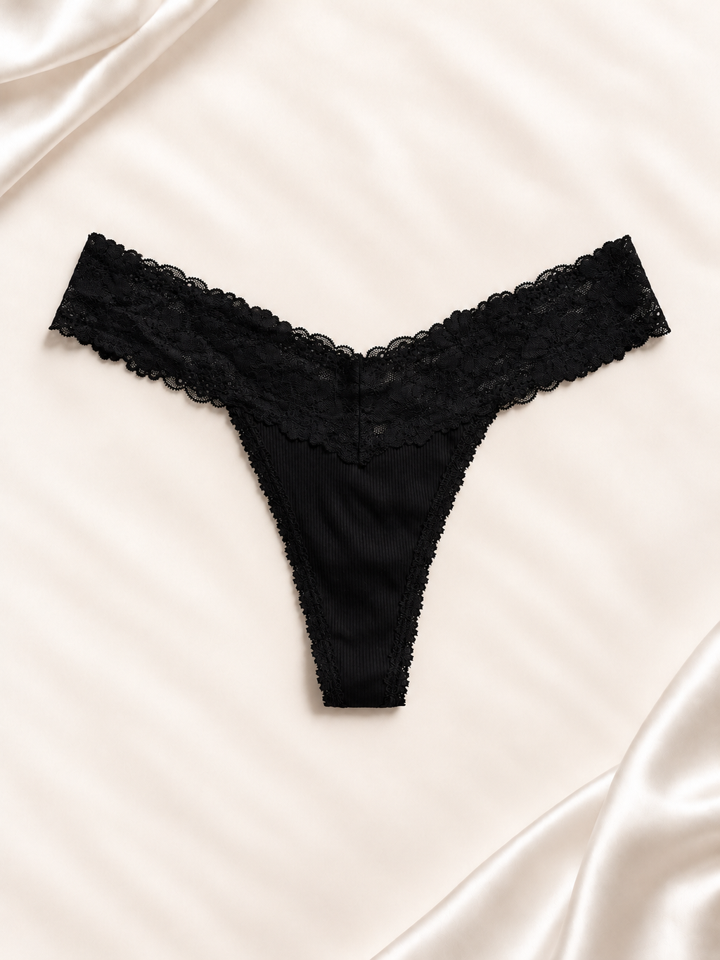 Frente de Panti V'S negro de encaje con cintura floral