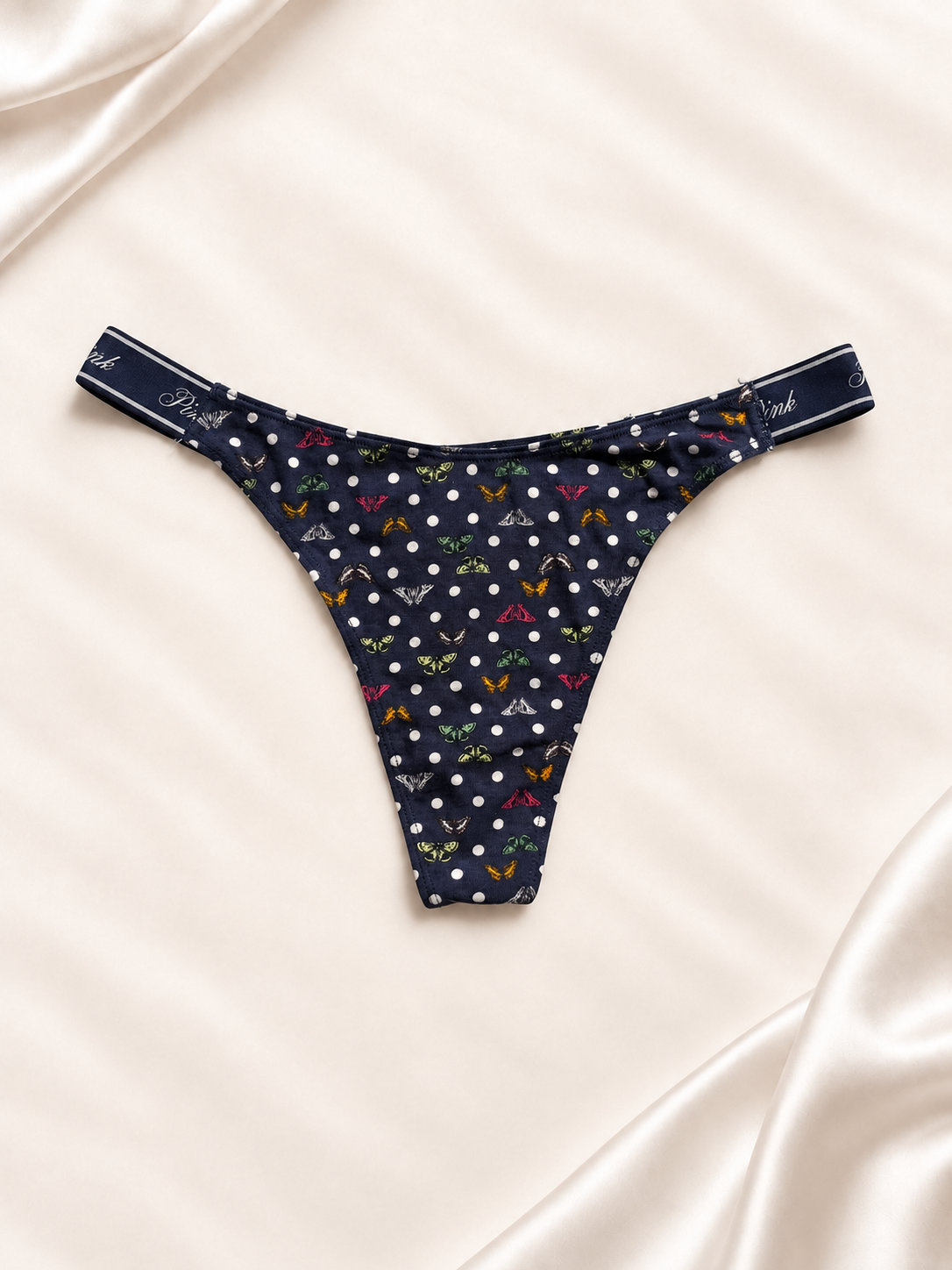 Frente de Panti PINK azul marino con lunares de colores