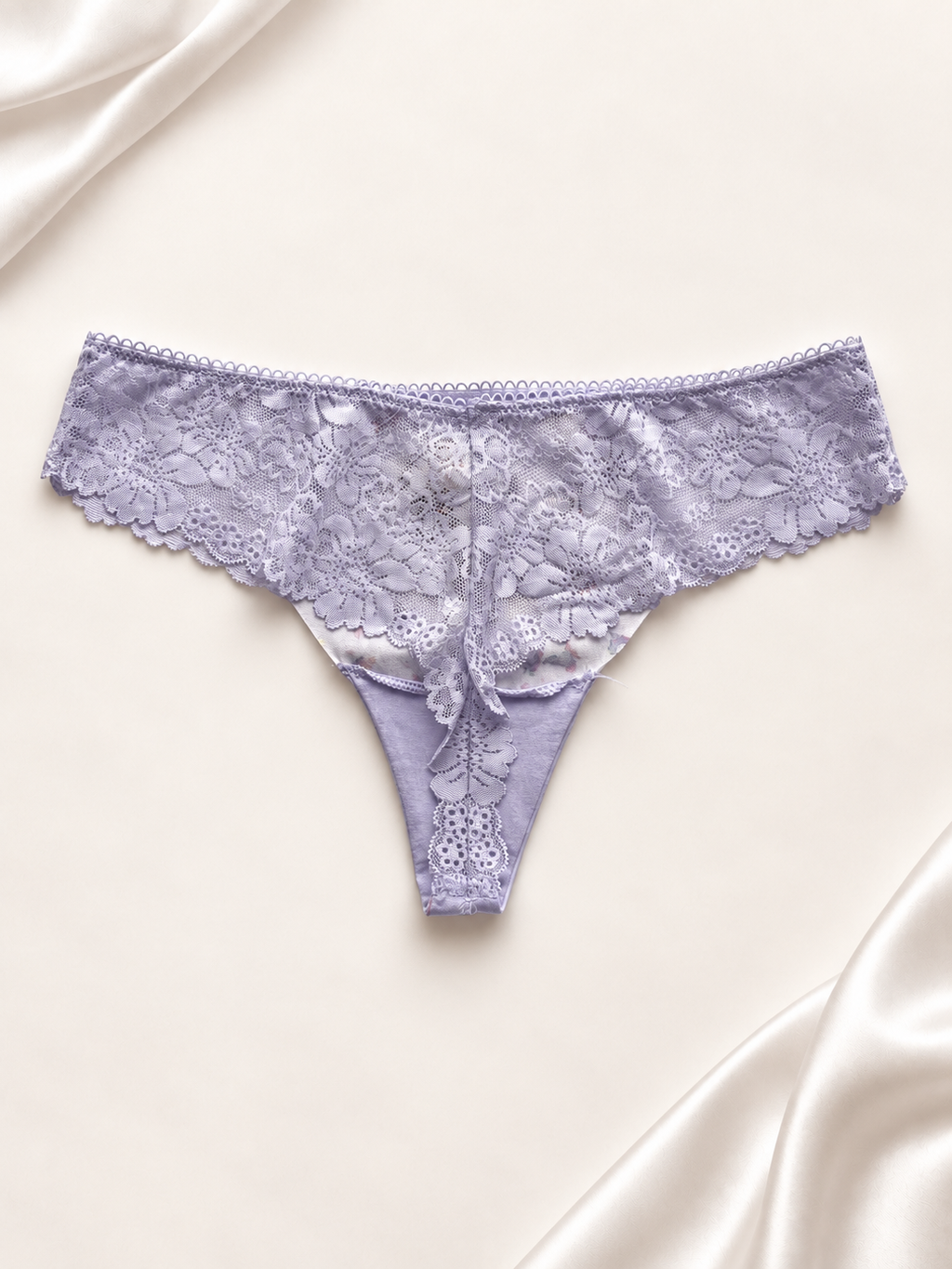 Panti lila con estampado floral y encaje, vista dorso