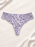 Panti lila con estampado floral y encaje, vista frente