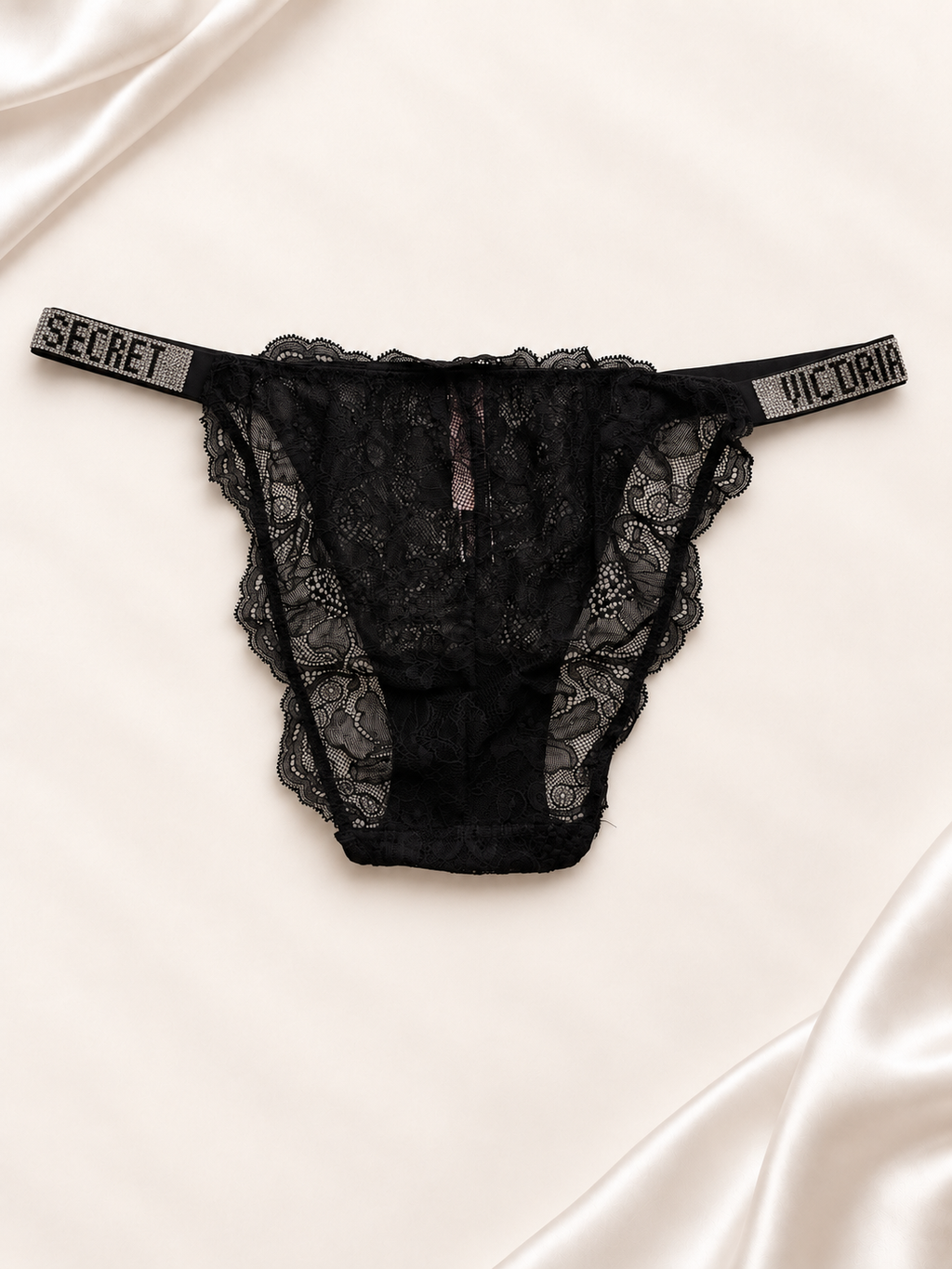 Panti V'S Negro de encaje con bandas estampadas, vista posterior