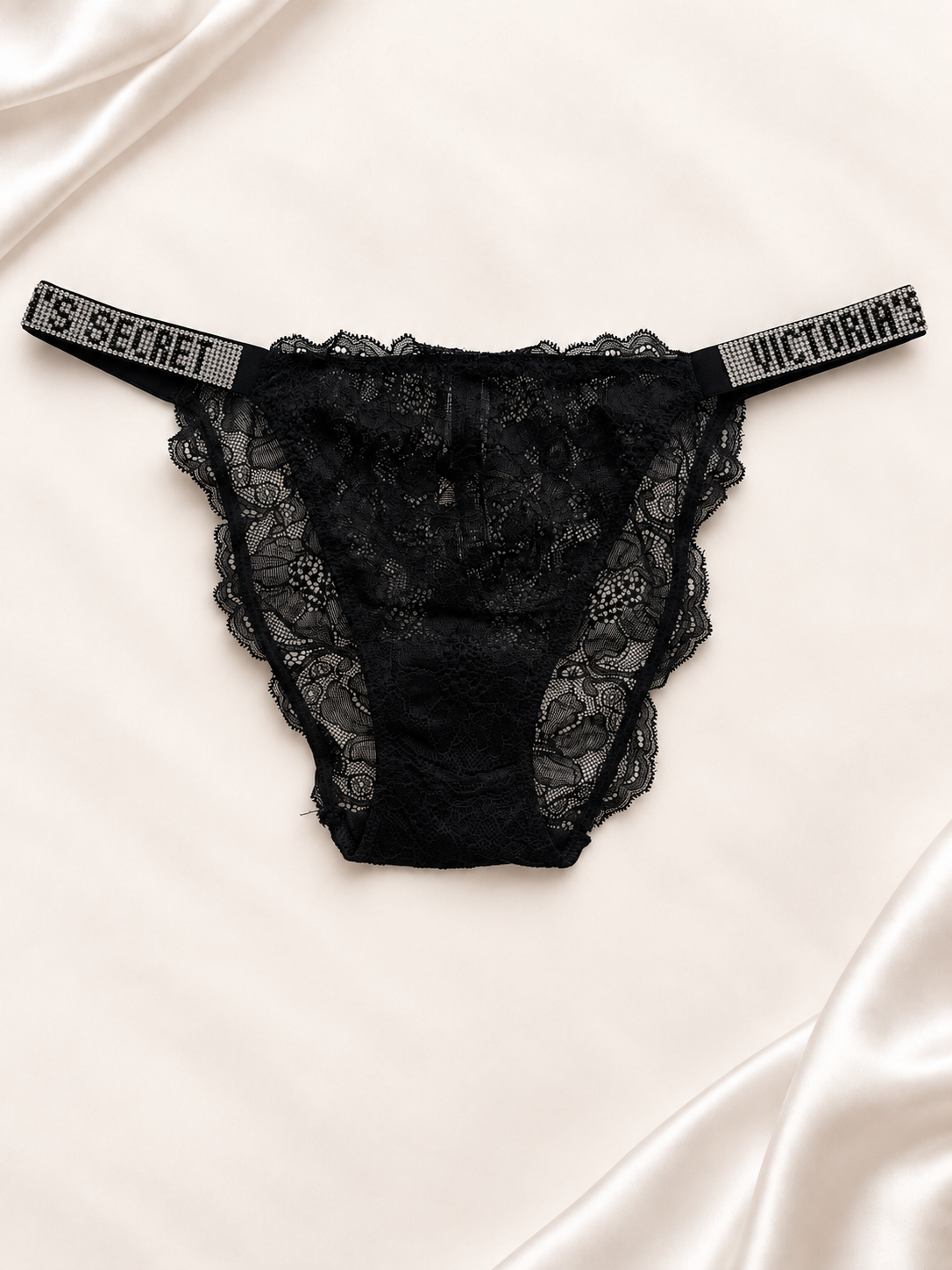 Panti V'S Negro de encaje con bandas estampadas, vista frontal