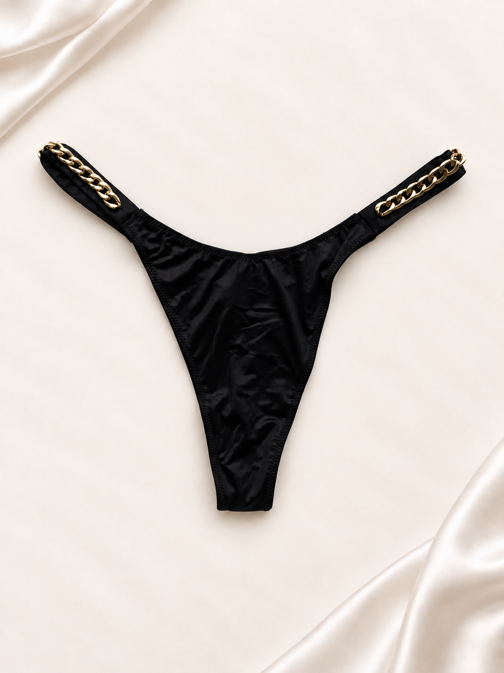 Panti V'S Negro con tiras de cadena dorada, vista frontal