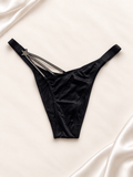 Panti V'S Negro liso con tiras cruzadas, vista frontal