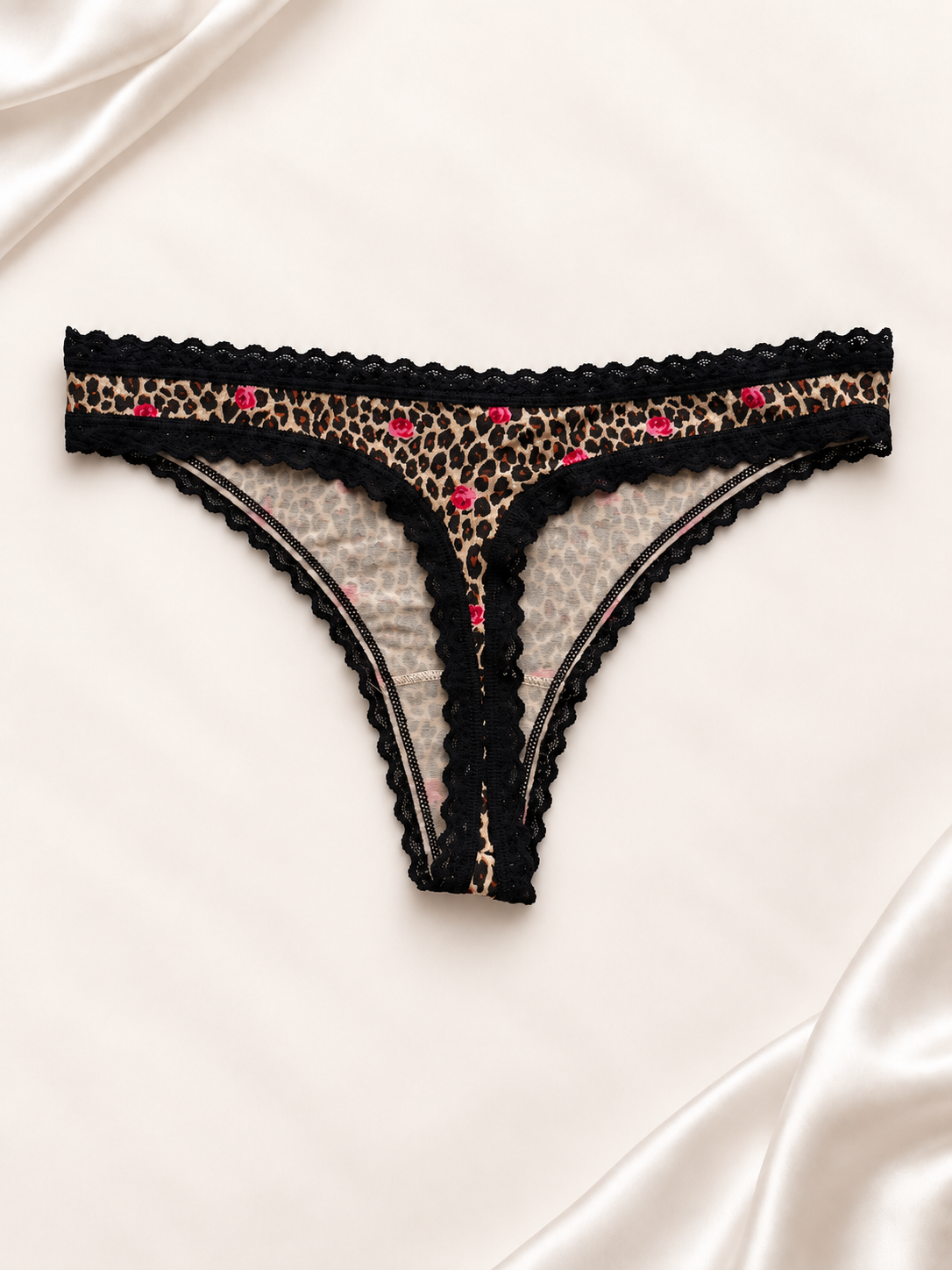 Panti V'S Negro con estampado floral y animal print, vista posterior