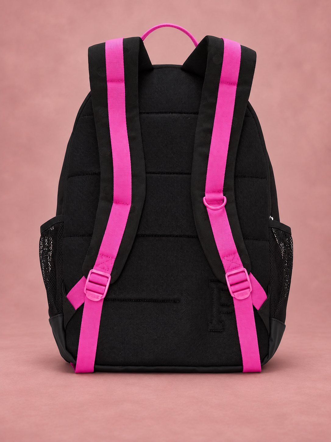 Dorso de mochila PINK negra a lunares con correas fucsia