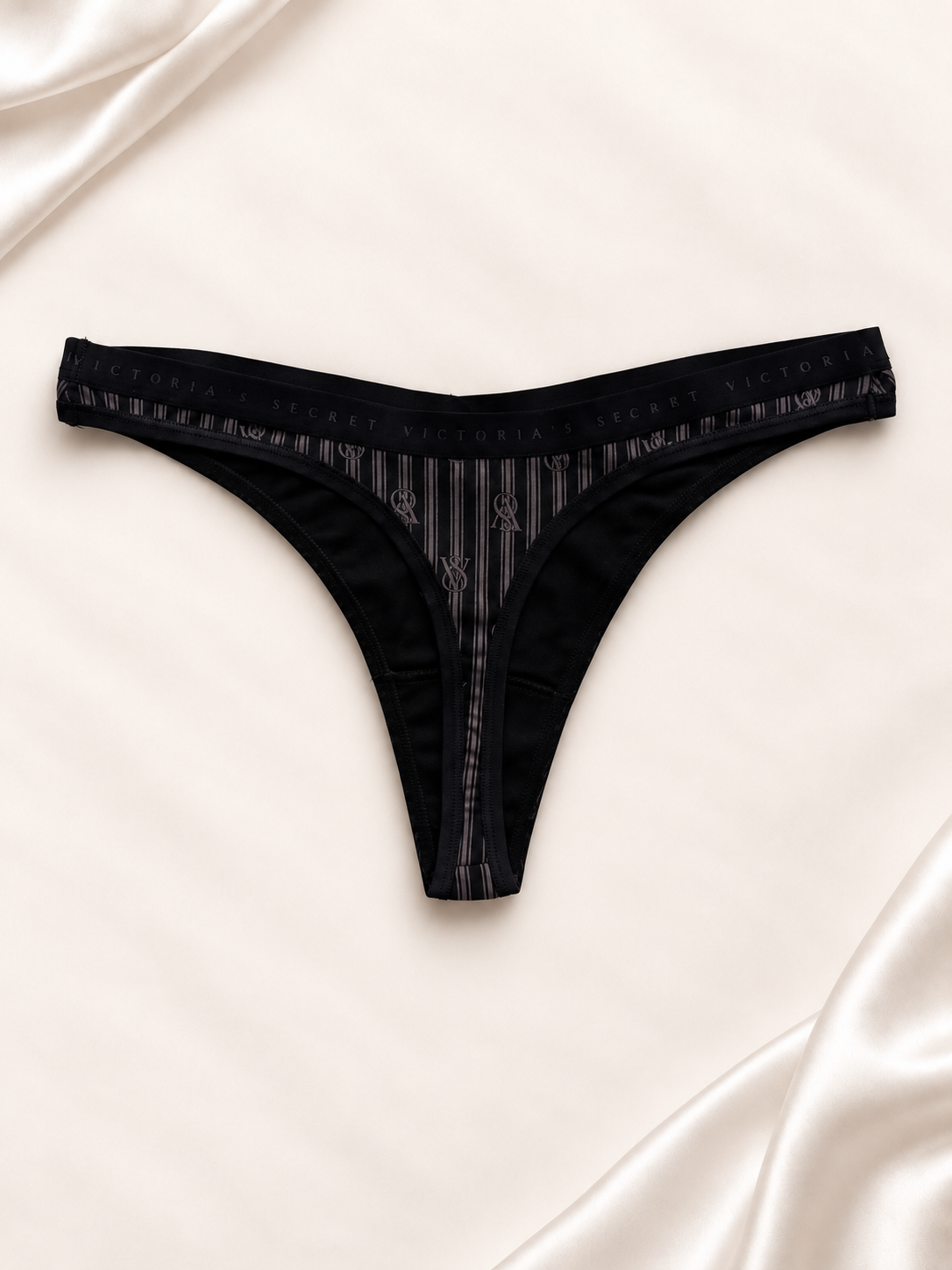 Panti V'S Negro con transparencias a rayas, vista posterior