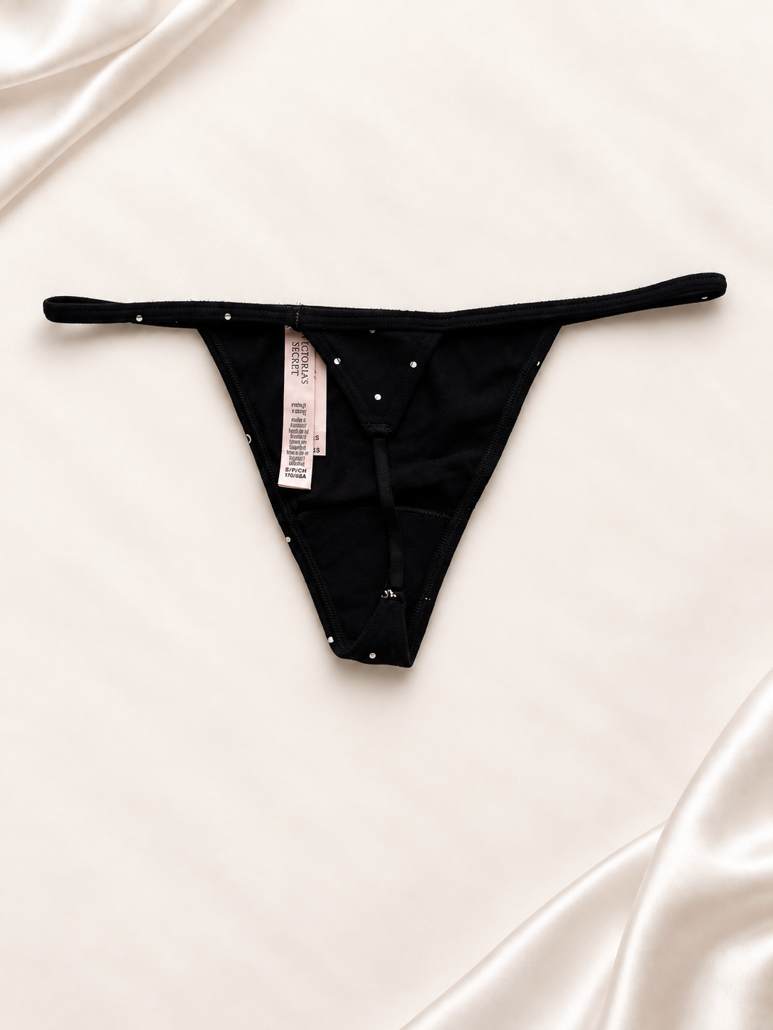 Panti V'S Negro con lunares y tiras finas, vista posterior