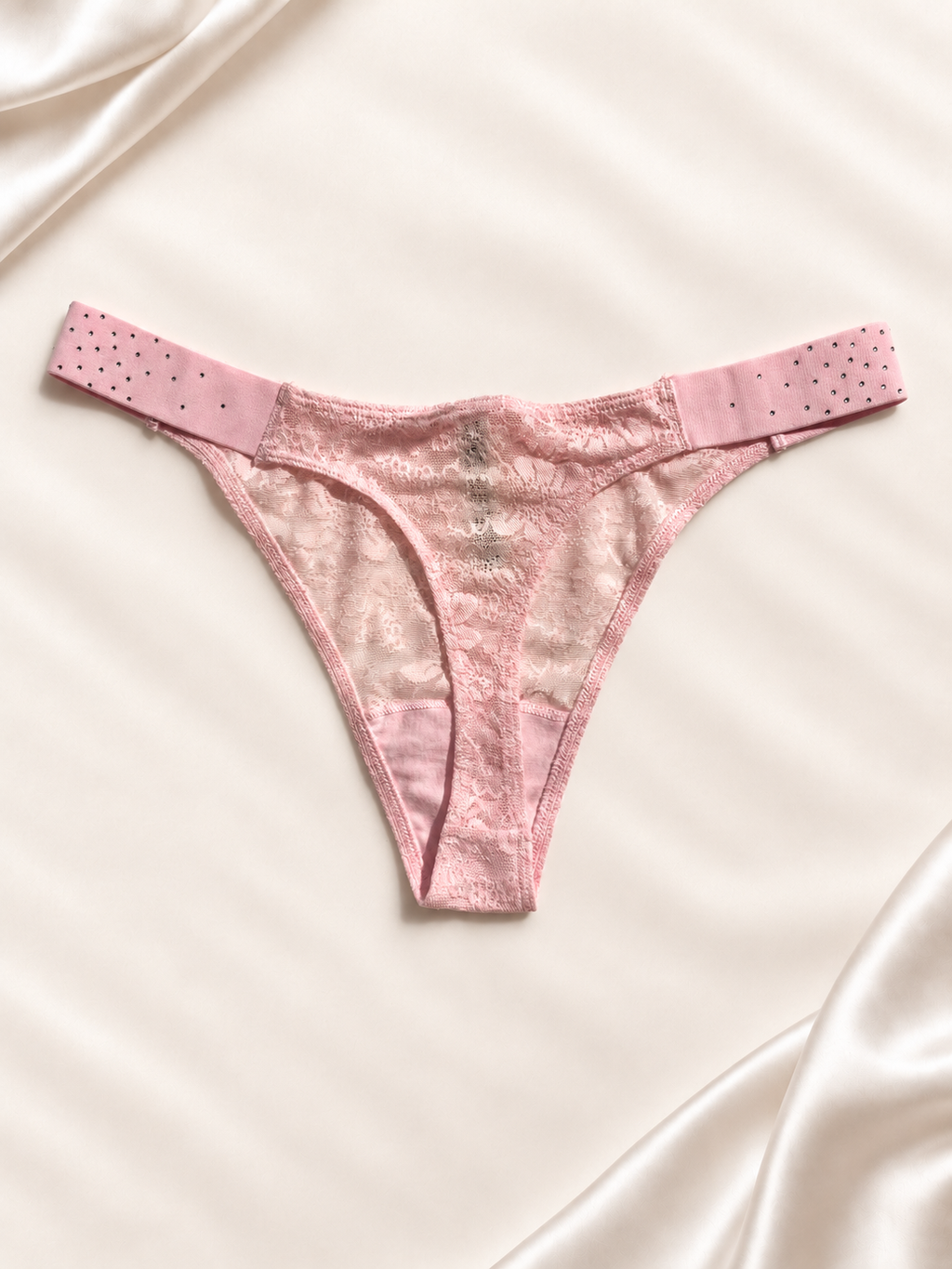 Dorso de Panti V'S rosa claro de encaje con strass