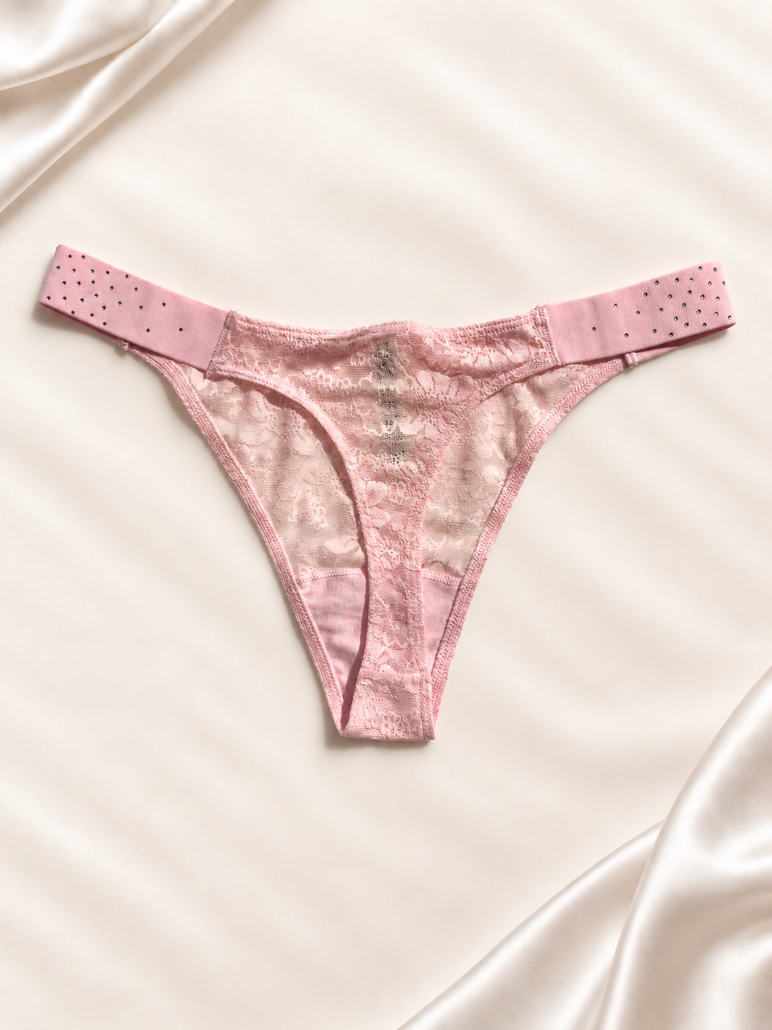 Dorso de Panti V'S rosa claro de encaje con strass