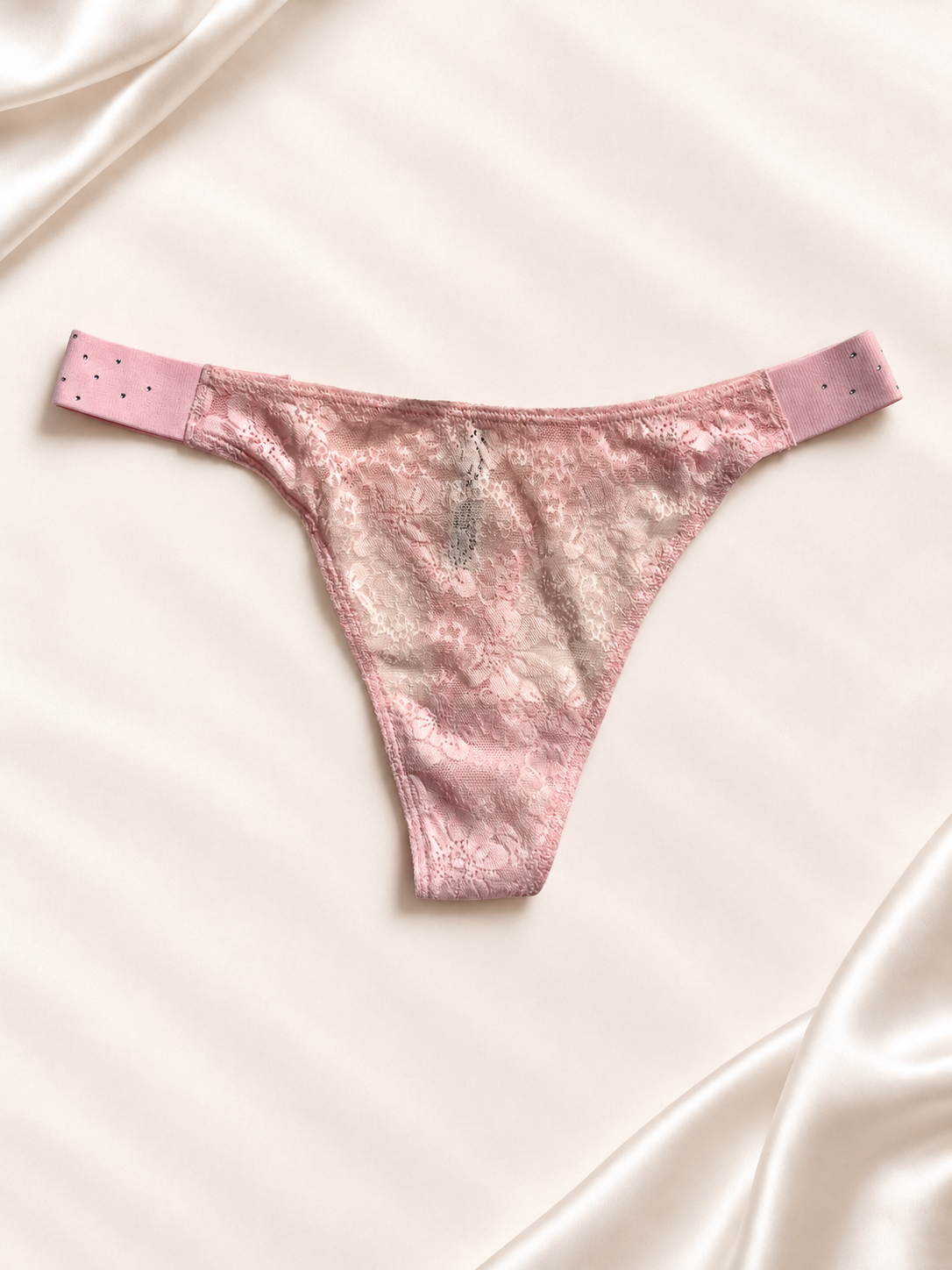 Frente de Panti V'S rosa claro de encaje con strass