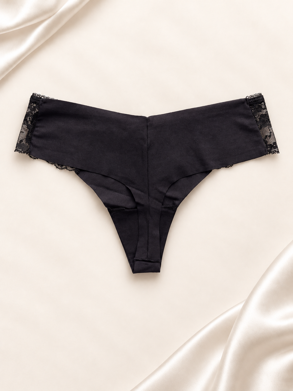 Panti V'S Negro liso con laterales de encaje, dorso