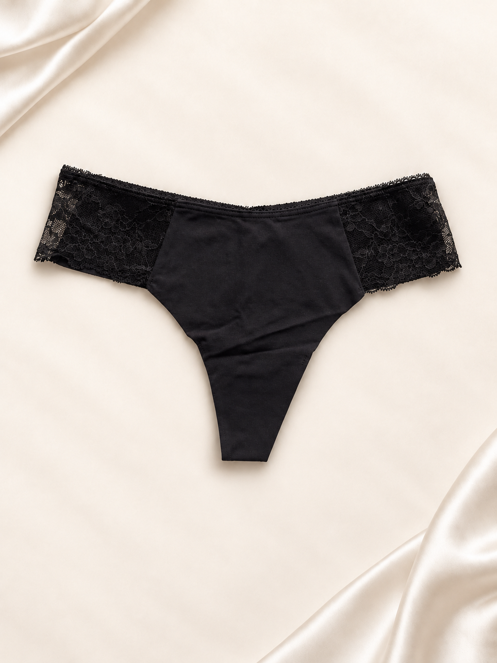 Panti V'S Negro liso con laterales de encaje, frente