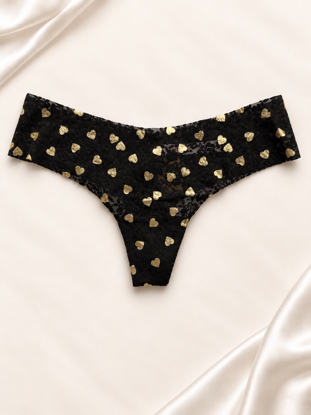 Panti V'S Negro con corazones dorados de corte tanga, frente