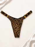 Panti V'S Animal Print con Tiras Logo Brillantes, vista frontal sobre fondo marfil
