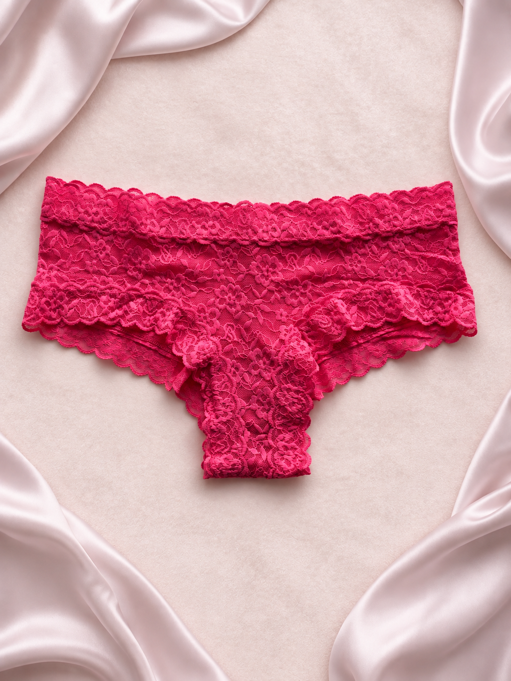Panti de encaje floral fucsia, vista frontal