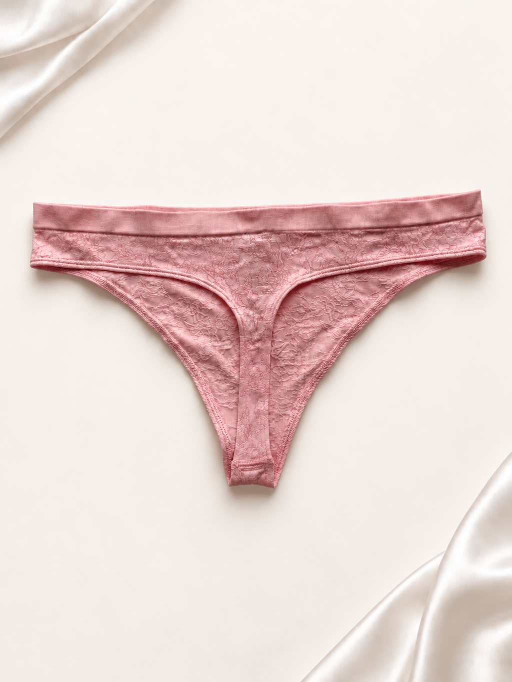 Panti V'S Rosa con Textura Floral, vista dorsal sobre fondo marfil