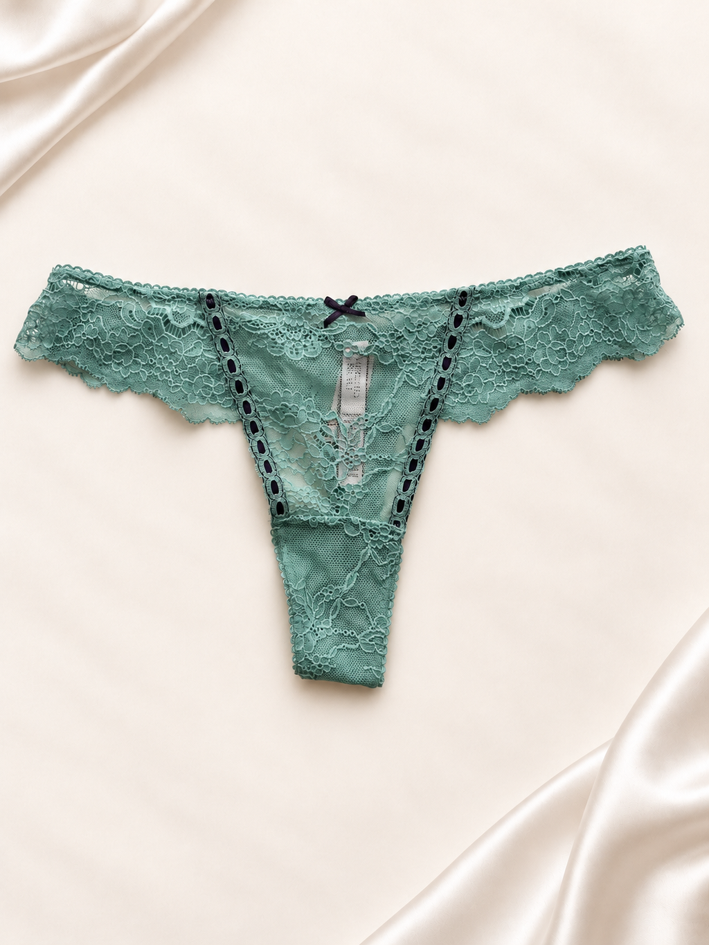 Panti V'S verde agua de encaje con moño, vista frontal