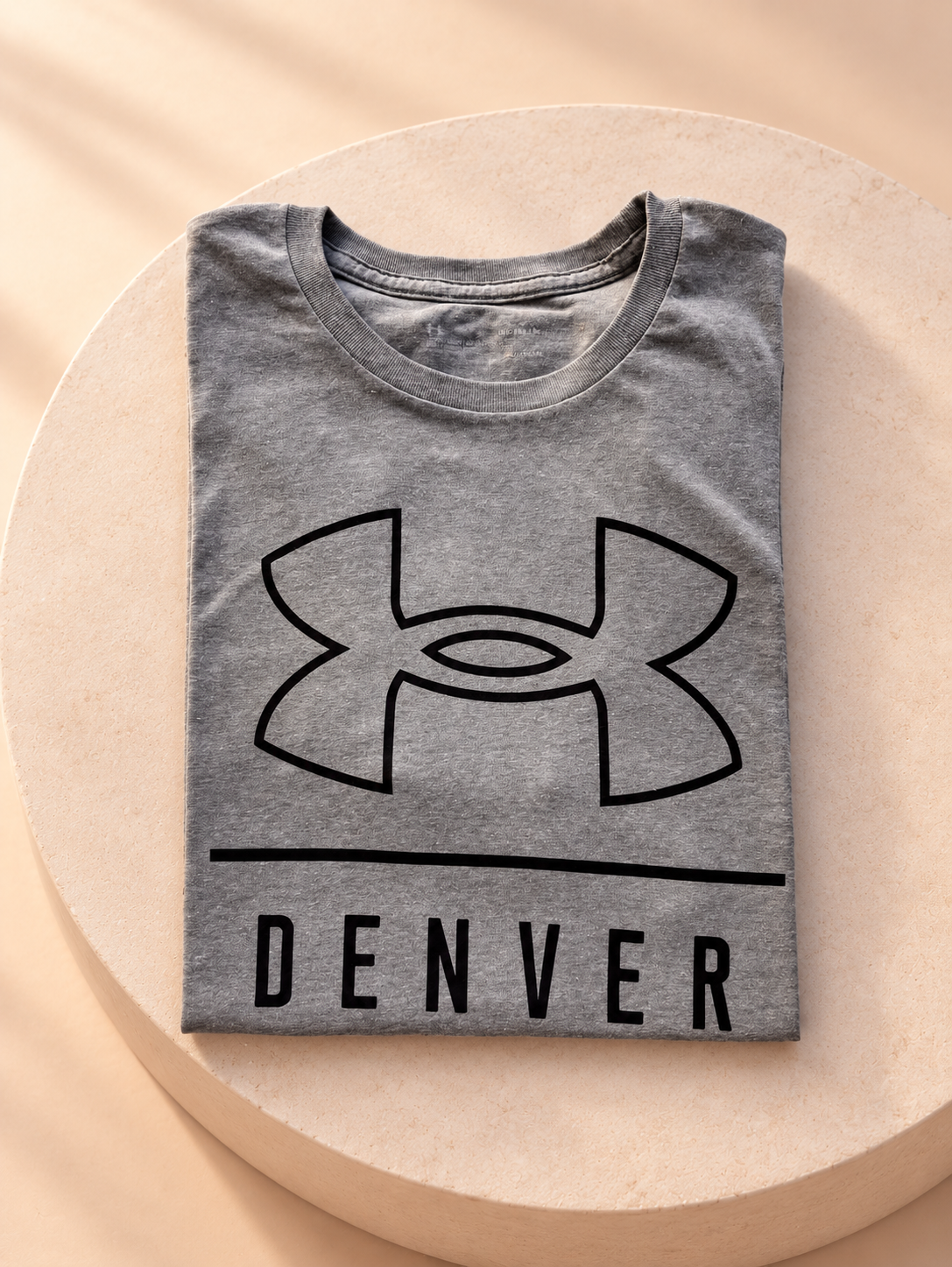 Remera Under Armour Denver gris, vista plegada