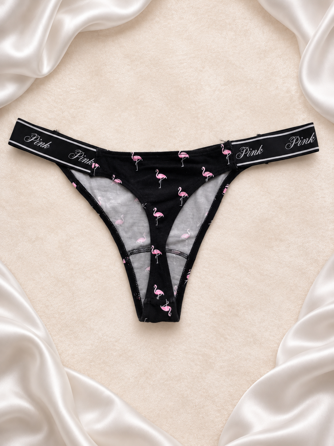 Panti Pink negro con estampado de flamencos, vista uno