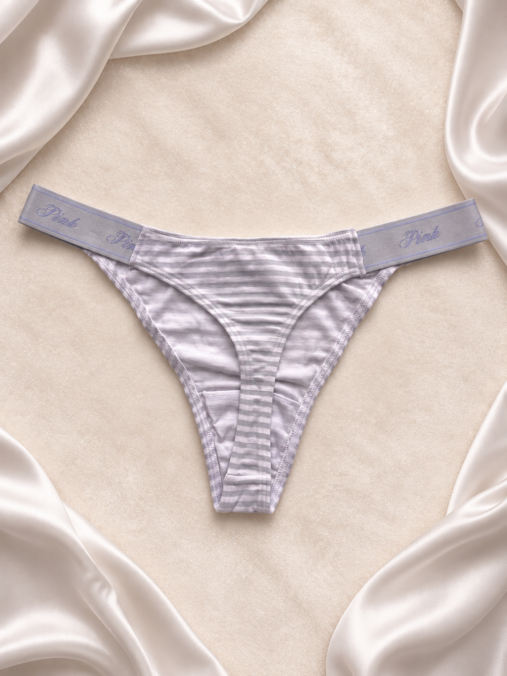Panti Pink rayado gris con logo perrito, vista uno