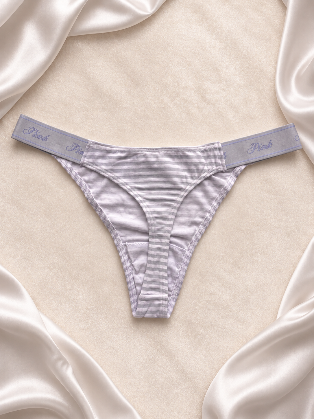 Panti Pink rayado gris con logo perrito, vista uno